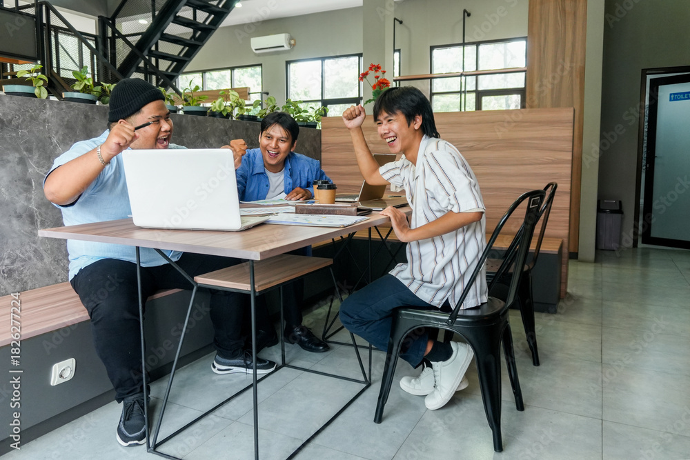Fototapeta premium Energetic Team Celebrates Project Success With High Fives And Laughter Around Modern Office Table