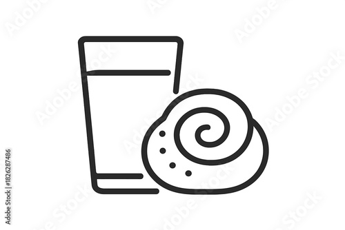 Glass of milk and a sweet cinnamon roll pastry served for breakfast or a delicious snack