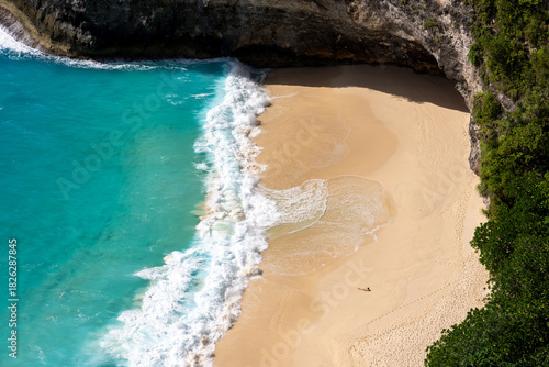 Aerial view of the waves at Crystal Bay beach Nusa Penida, Bali. High quality photo