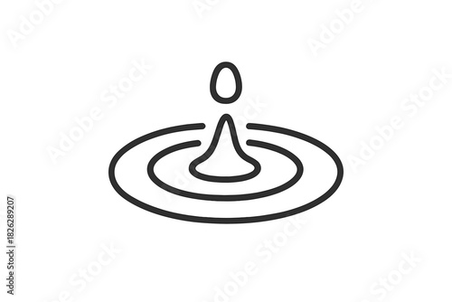 Falling liquid drop creating concentric circular ripples on water surface