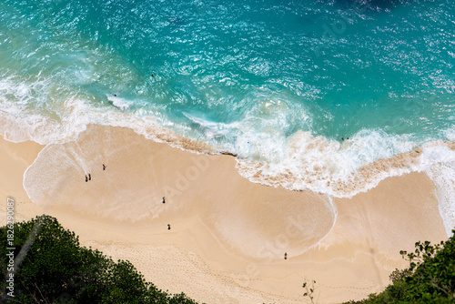 Aerial view of the waves at Crystal Bay beach Nusa Penida, Bali. High quality photo