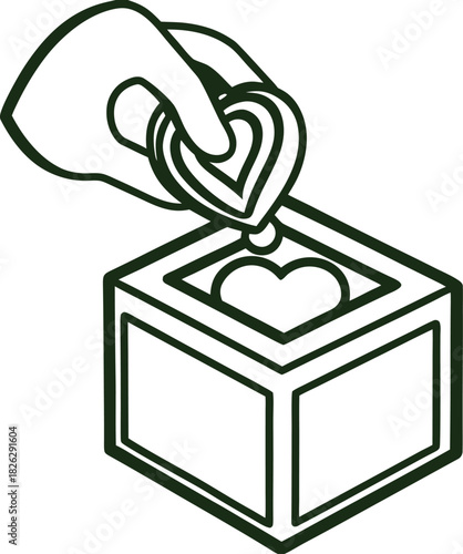 Hand dropping heart into donation box charity giving