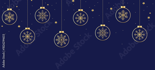 Christmas and New Year garland with golden balls and snowflakes on the blue background. Winter holiday horizontal banner. 