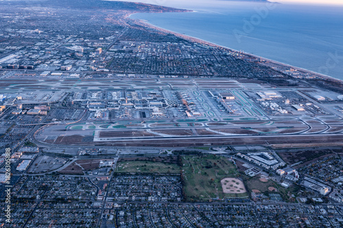 Aerial Panorama of Los Angeles International Airport LAX and Surrounding Urban Coastline at Sunrise