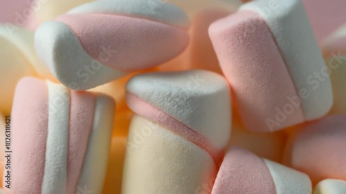 Colorful marshmallows stacked together in a close-up view.