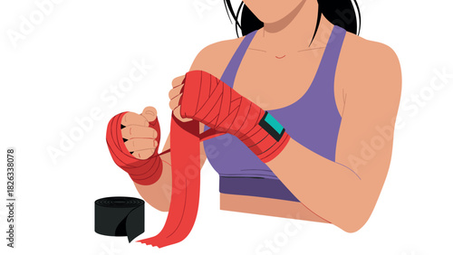 Athletic woman preparing for boxing workout with hand wraps