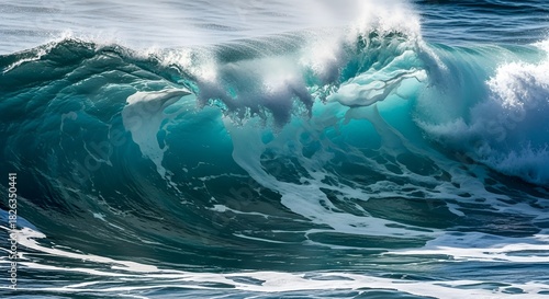 Fototapeta Naklejka Na Ścianę i Meble -  Crashing ocean wave with sea foam powerful nature scene perfect for backgrounds and travel imagery