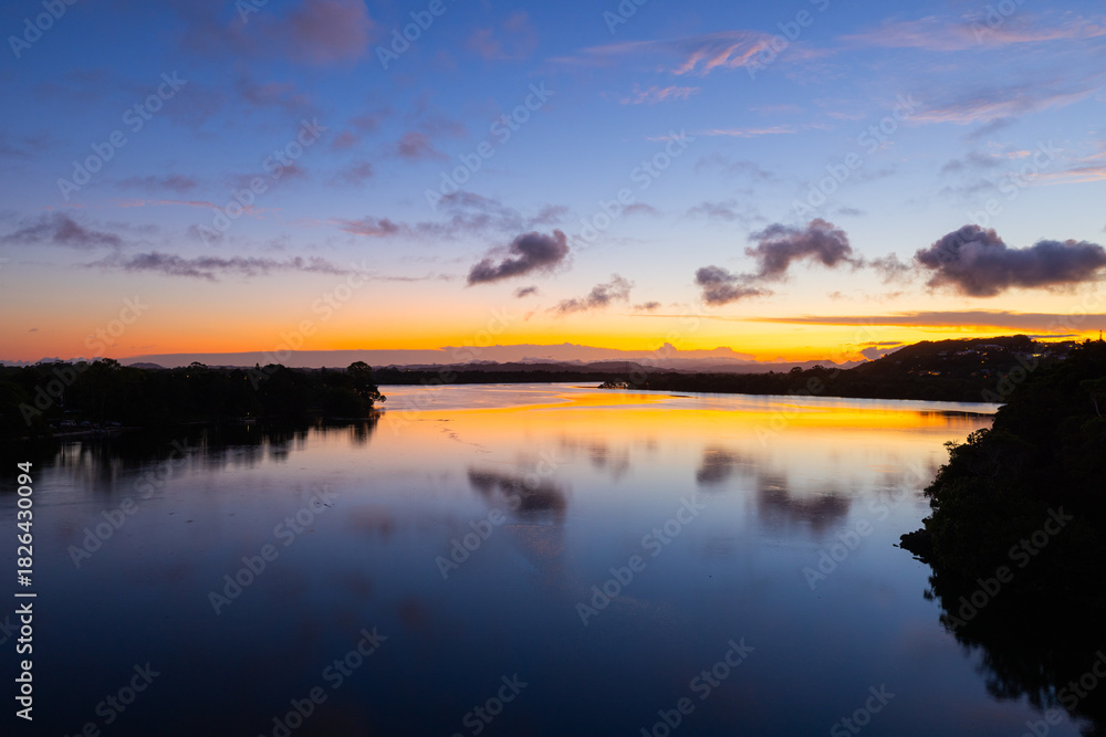 Fototapeta premium Scenic sunset views over the Tweed River Inlet from Barneys Point bridge in Banora Point, New South wales, Australia