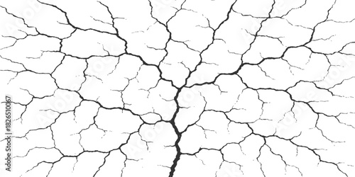 Dry, cracked earth texture showing a drought pattern of cracks in arid soil or clay ground