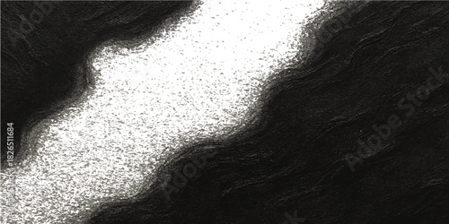 Black and white abstract macro closeup texture of liquid splash pattern on paper