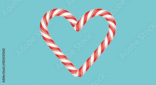 Two candy canes forming a heart shape on blue background