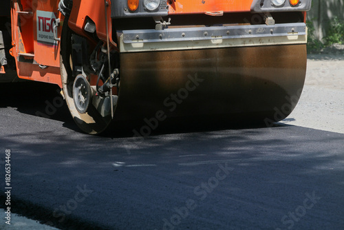 Wallpaper Mural Single-Drum Roller Paving Fresh Asphalt Torontodigital.ca