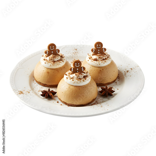 Individual Gingerbread Mousse Domes Topped with Whipped Cream and Mini Gingerbread Man Cookies isolated on a transparent background 