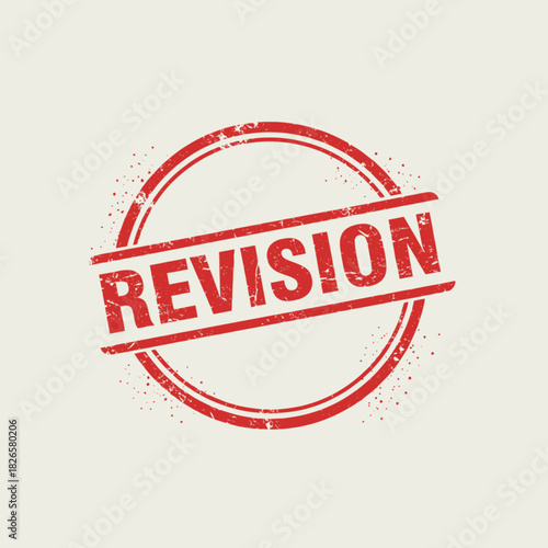 Red grunge revision rubber stamp on a light background, indicating a need for review or change.