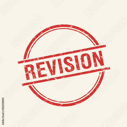 Red distressed rubber stamp with the word "REVISION" in a circular frame on a light background, symbolizing a need for changes or updates.