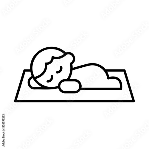 Child napping on mat