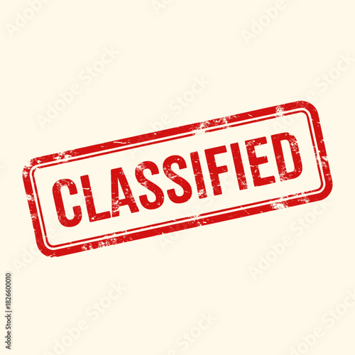 A red rectangular rubber stamp with the word "CLASSIFIED" in capital letters, tilted slightly on a light background.