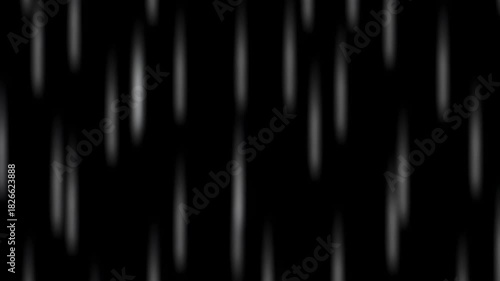 Abstract vertical lines with a dark background creating a blurred effect.