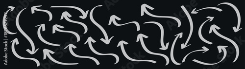 Hand drawn arrows in various directions on a black background for design elements