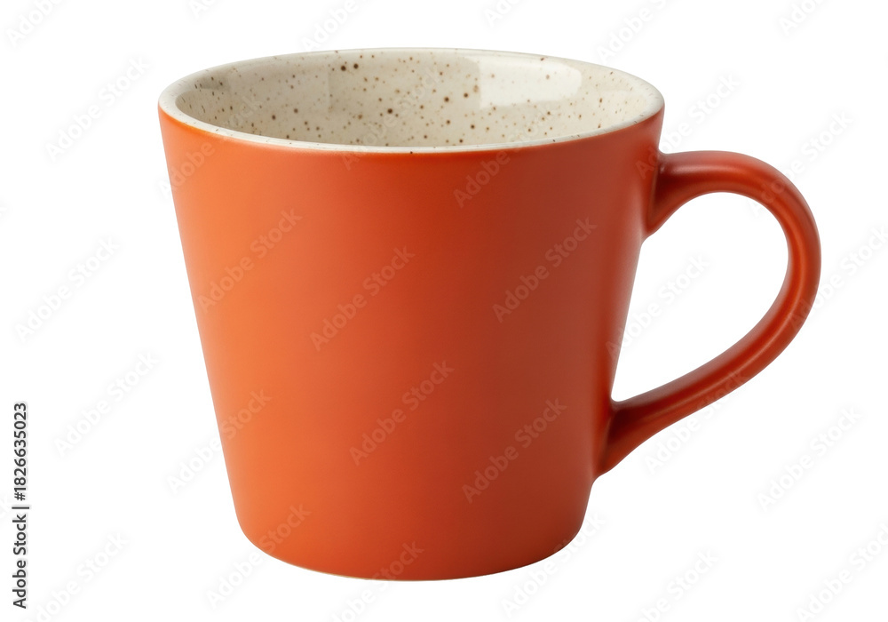 Obraz premium Isolated Orange ceramic mug with a dotted interior for hot beverage on a solid background