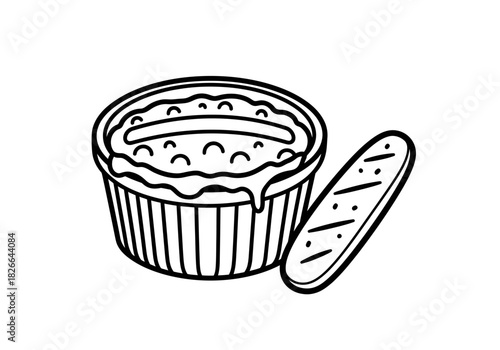 Black and white line drawing of a baked dish in a fluted ramekin with a side of bread