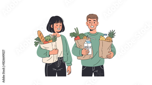 Happy young couple carrying paper grocery bags full of fresh, healthy food and produce after shopping together