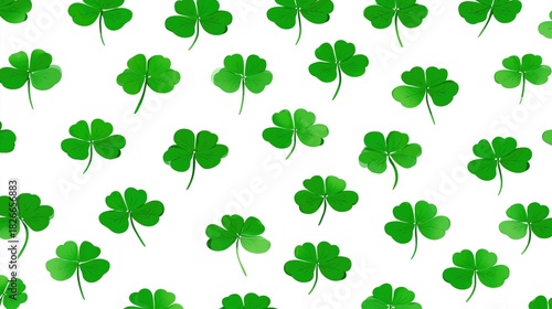 Seamless pattern with green shamrocks on white background, St. Patrick’s Day symbol and spring holiday design for fabric, wallpaper or festive decoration
