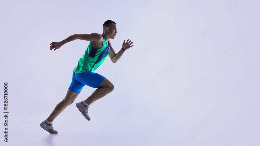Naklejka premium Runner pushing into powerful sprint position. Concept of coaching materials for sprint starts, sports club marketing, athletic performance analysis, and training guide illustrations.