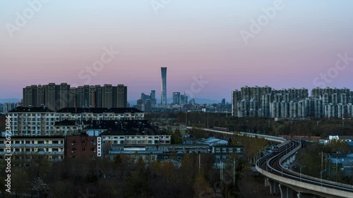 Time-lapse footage of Beijing, China’s subway and light rail passing through commercial and residential districts from day to night
