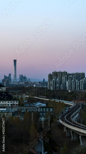 Time-lapse footage of Beijing, China’s subway and light rail passing through commercial and residential districts from day to night