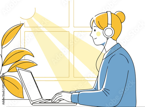 Business professional working on laptop with headset in a bright office setting with plant.