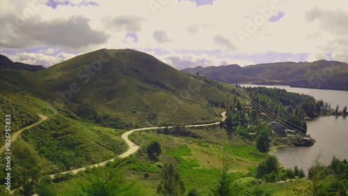lagoon surrounded by pine trees, with a mountain surrounding, Corani Lagoon, Cochabamba, Bolivia. 