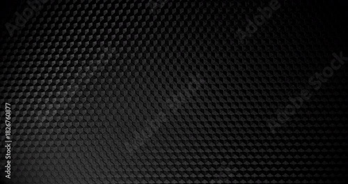 Carbon Texture. Close-up of premium black carbon fiber weave with subtle light shift, creating a high-tech, endlessly background.