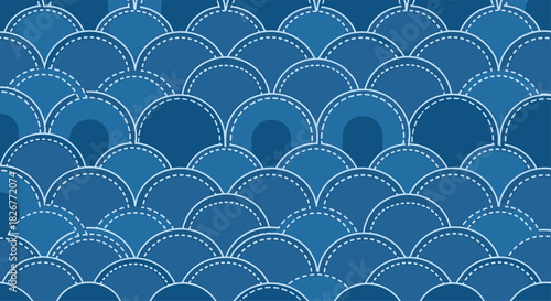 A seamless blue denim-inspired pattern featuring interlocking scallop shapes with white dashed stitching and subtle darker pocket-like elements, creating a textured fabric design.