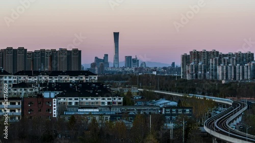 Time-lapse footage of Beijing, China’s subway and light rail passing through commercial and residential districts from day to night