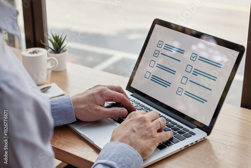 man filling form with checkboxes online, questionnaire survey on the screen