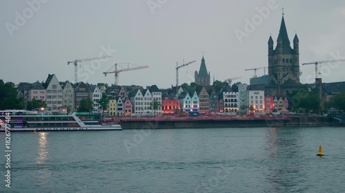 Wallpaper Mural Cityscape of old town waterfront illuminated coloured houses at dusk in Cologne, Germany. Torontodigital.ca