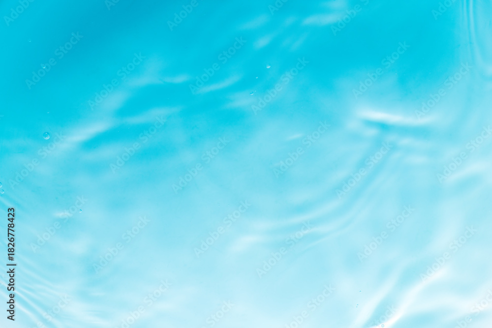 Obraz premium Macro blue water wave texture,Banner of Blue Abstract water background texture with ripples and waves,Blue macro water wave texture and circles.