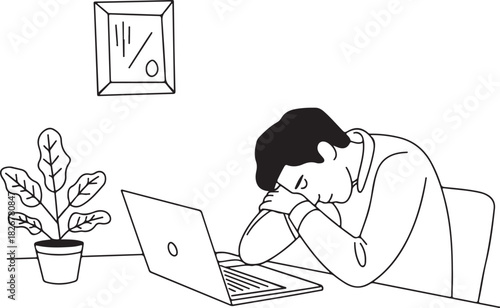 Exhausted man rests his head at his desk near a laptop in a white scene