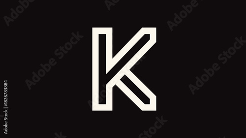 Stylized uppercase letter K in geometric outline font on dark background for branding and design projects