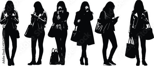 Silhouettes of women standing and using smartphones in casual clothing, urban lifestyle concept showing modern technology habits, isolated black figures