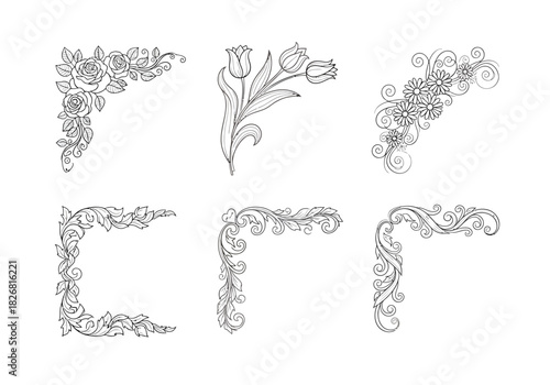 Six black and white floral and scrollwork corner embellishments