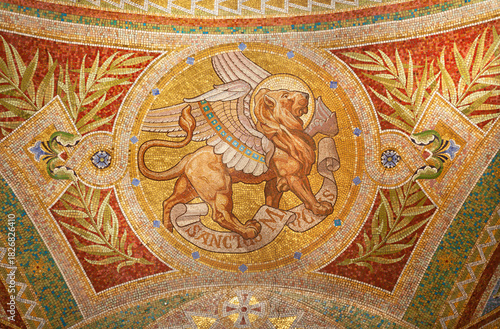 Madrid - Mosaic of lion as symbol of Saint Mark the Evangelist in Iglesia de San Manuel y San Benito by architect Fernando Arbos from 19. cent.