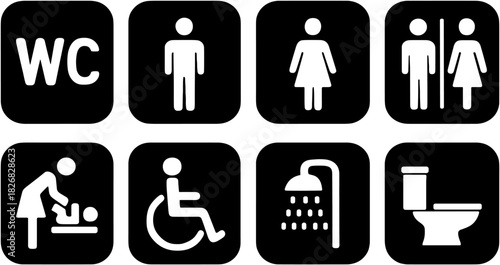 Bathroom signage with male, female, wheelchair accessible, and baby changing symbols in a public space