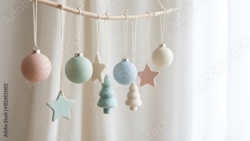 Minimal pastel christmas ornaments on a soft background