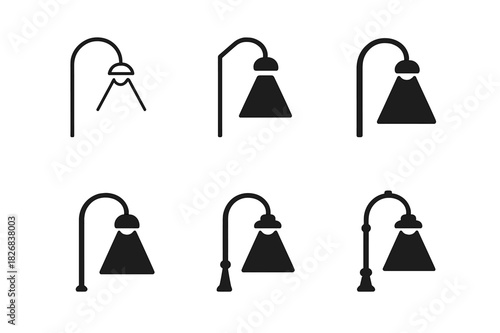 Streetlights Logo Set. Streetlights at night. Icon set. Set Logo of streetlights: curved lamp casting beam. harmonious logo variations of the same emblematic