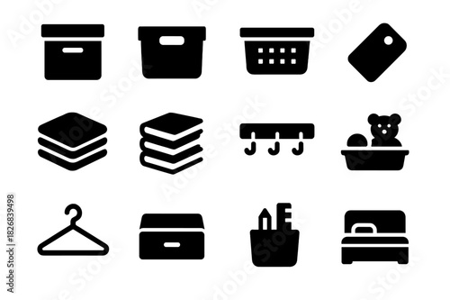 Organized Spaces Icons. Organized Spaces. Solid icon set of Organized Spaces: storage box, shelf bin, basket, label tag, folded clothes, stack of books, peg