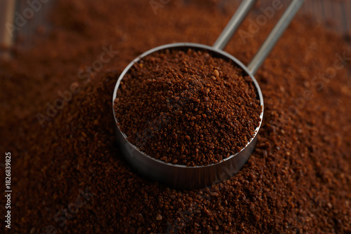 Wallpaper Mural Mound of Dark Brown Coffee Grounds with Measuring Spoon Torontodigital.ca