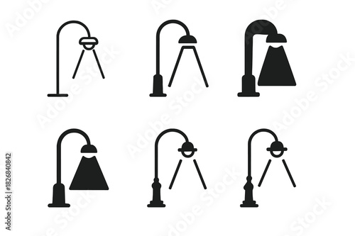 Streetlights Logo Set. Streetlights at night. Icon set. Set Logo of streetlights: curved lamp casting beam. harmonious logo variations of the same emblematic