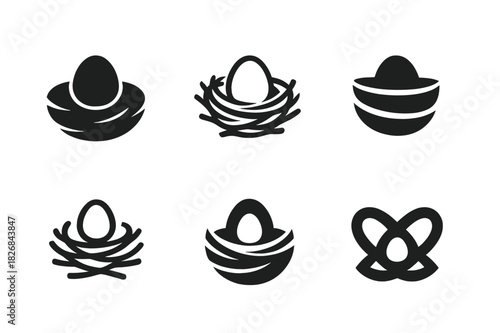 Nest Logo Variations. Nest. Icon set. Set Logo of nest: natural habitat emblem. harmonious logo variations of the same emblematic concept, each with different